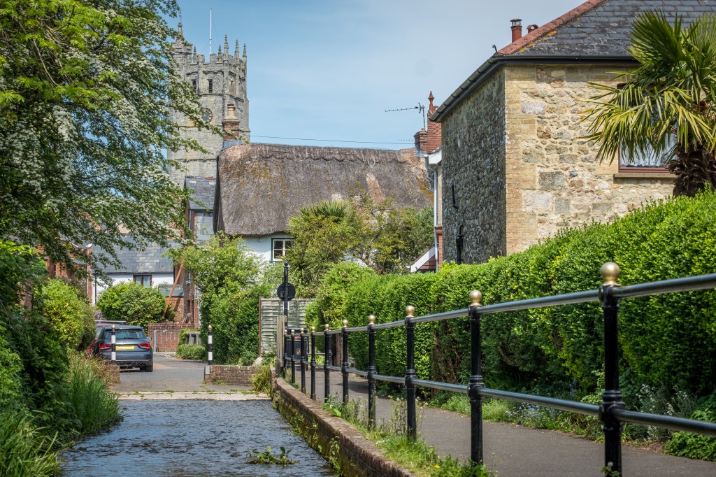 Lot: 108 - CHARMING COTTAGE WITH SELF-CONTAINED ANNEXE, GARDENS AND GARAGE - View towards historic castle